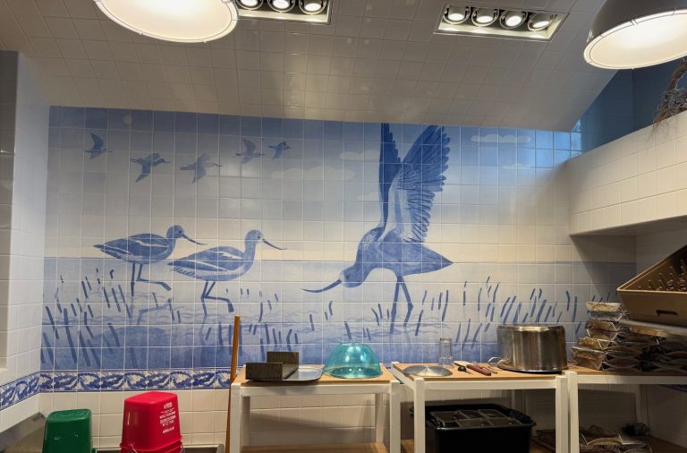 Large custom porcelain tile mural installed at Wavetronix in Utah.