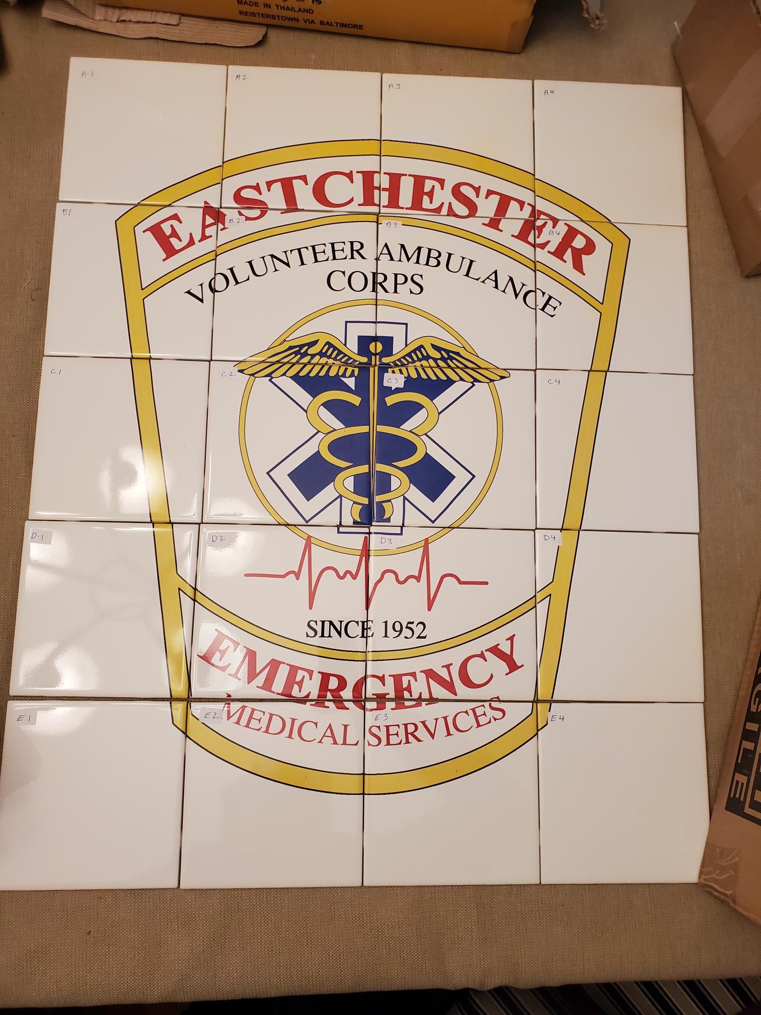 Eastchester EMS custom porcelain tile mural laid out and numbered before shipping